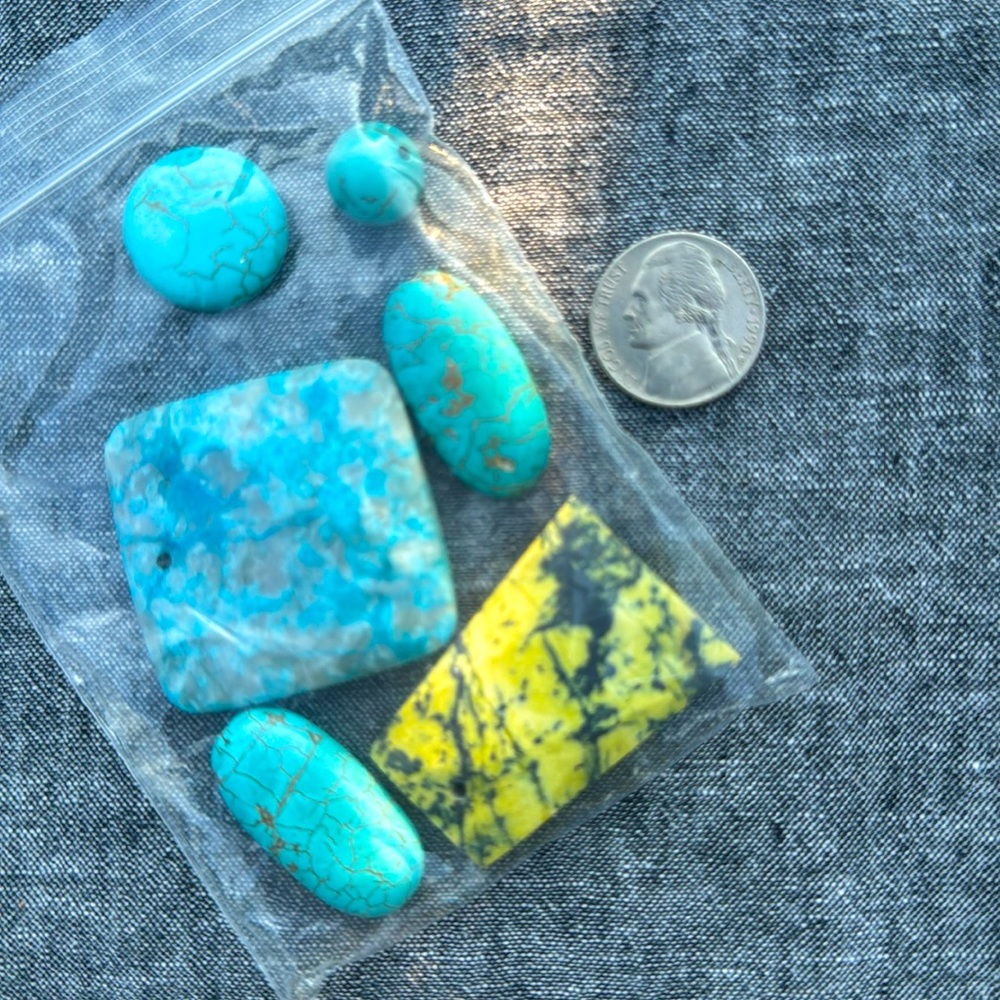 Turquoise like stones all with holes for jewelry making